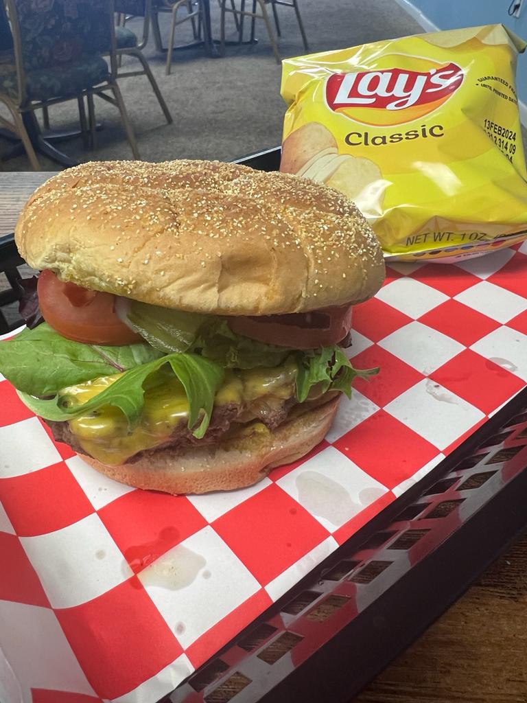 A burger on a tray.